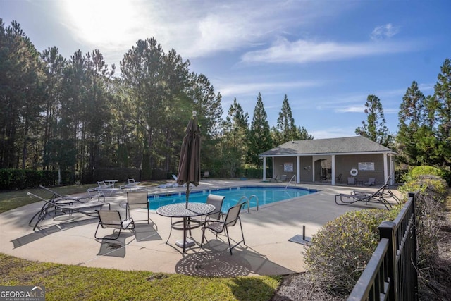 view of pool featuring a patio