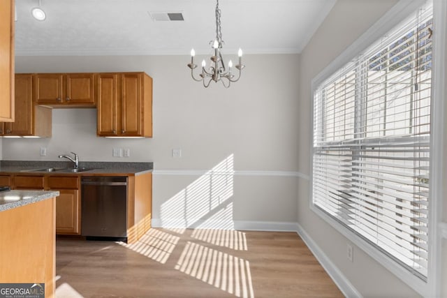 kitchen with pendant lighting, dishwasher, sink, a notable chandelier, and light hardwood / wood-style flooring