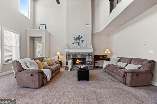 bedroom featuring light carpet, ceiling fan, crown molding, and beam ceiling