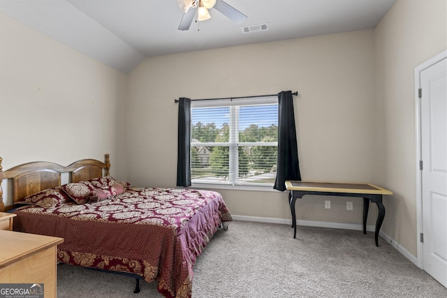 bedroom featuring ceiling fan, lofted ceiling, and carpet floors