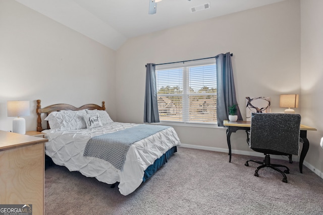 bedroom with baseboards, visible vents, a ceiling fan, lofted ceiling, and carpet flooring