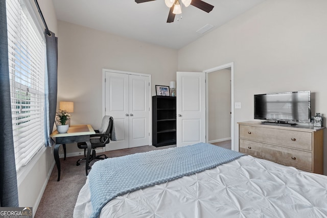 carpeted bedroom featuring visible vents, a closet, a ceiling fan, and baseboards