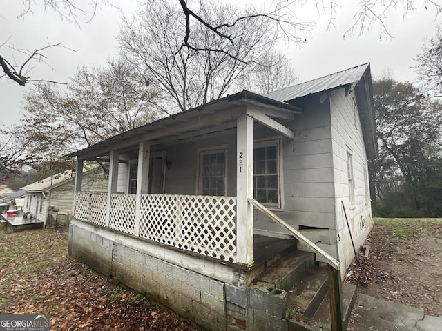 exterior space featuring covered porch