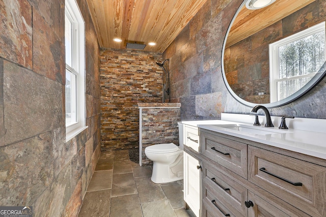 bathroom featuring toilet, a healthy amount of sunlight, wood ceiling, and walk in shower