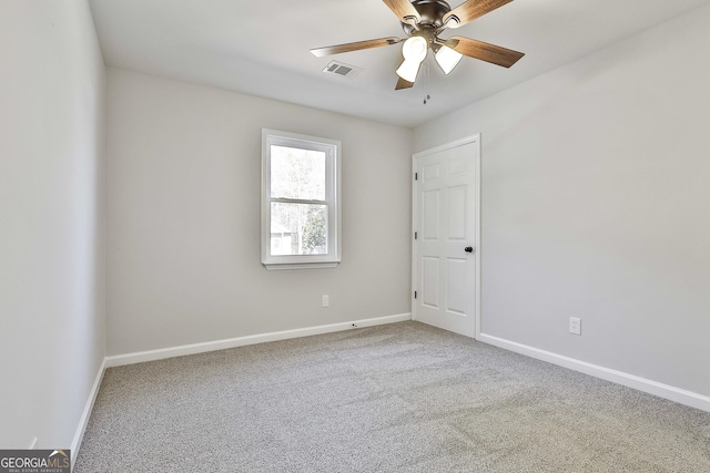 unfurnished room with carpet floors and ceiling fan