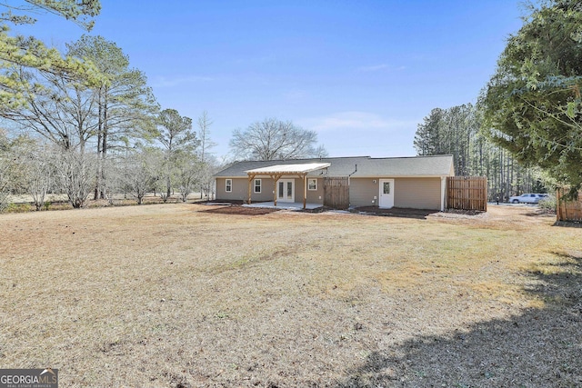 ranch-style house with a front yard