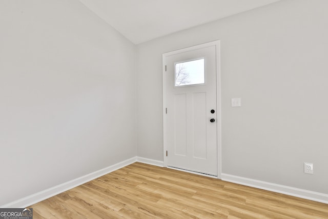 entrance foyer with light wood-type flooring