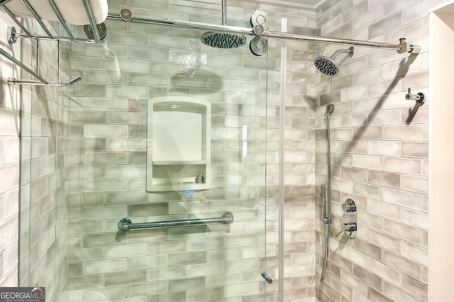 bathroom with a tile shower