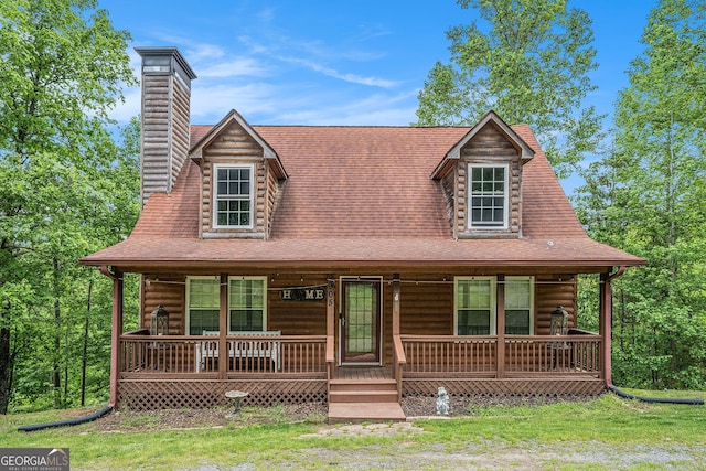 905 Hancock Mountain Trl, Waleska, GA 30183 - new england style home with covered porch and a chimney