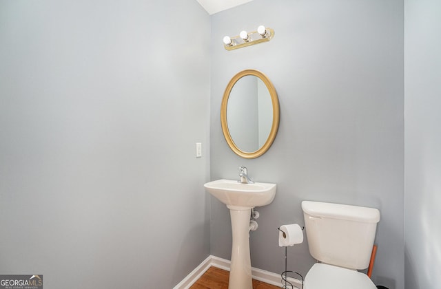905 Hancock Mountain Trl, Waleska, GA 30183 - bedroom featuring wood finished floors, baseboards, and ceiling fan