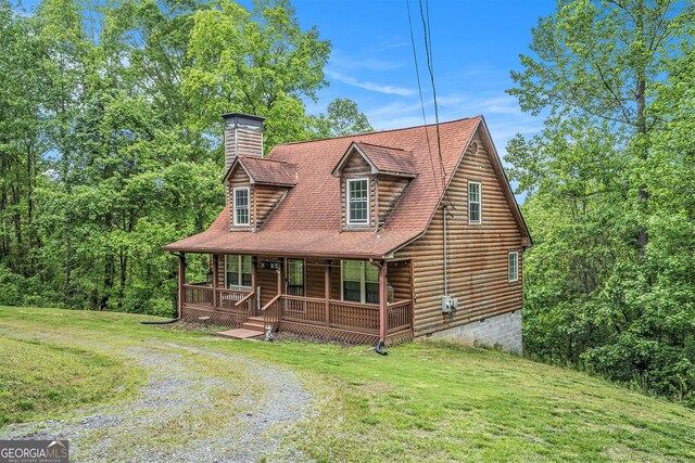 905 Hancock Mountain Trl, Waleska, GA 30183 - view of front of house with covered porch, driveway, a chimney, and a front yard