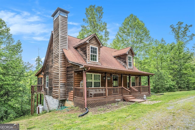 905 Hancock Mountain Trl, Waleska, GA 30183 - log-style house with a front lawn, a chimney, covered porch, and log exterior