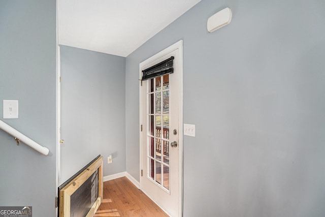 entryway with light hardwood / wood-style flooring