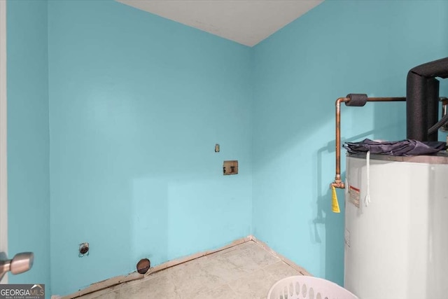 washroom with hookup for a washing machine, water heater, and hookup for an electric dryer