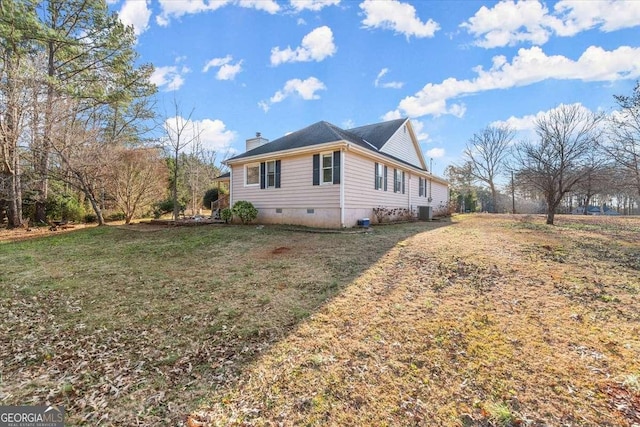 view of property exterior featuring cooling unit and a lawn