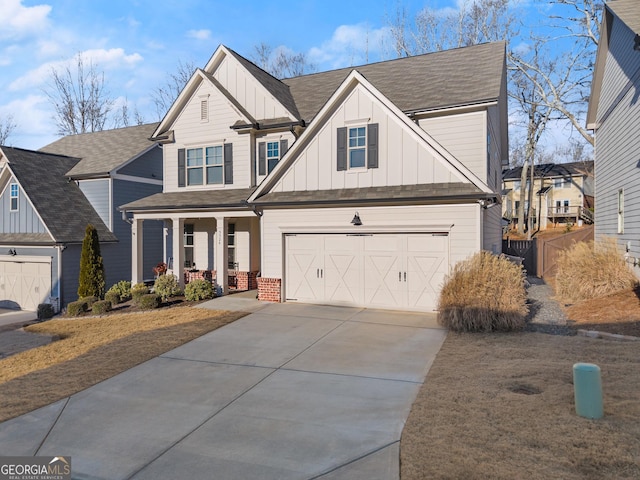 view of front of house with covered porch and a garage