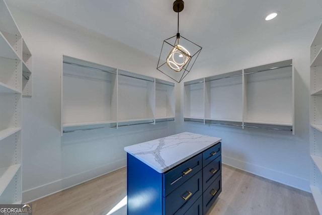 spacious closet with light wood-type flooring