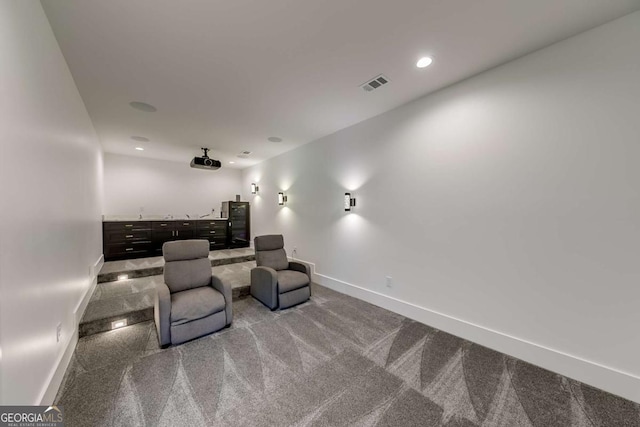 home theater room with carpet flooring