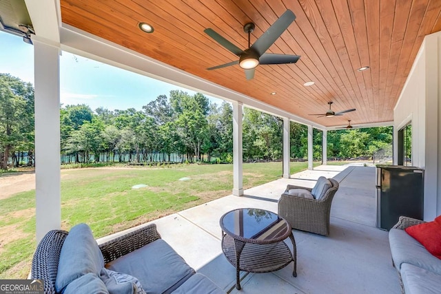 view of patio with ceiling fan