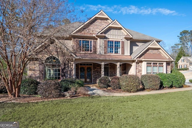 view of front facade with a porch and a front yard