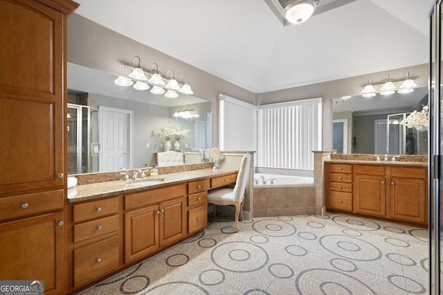 bathroom featuring tile patterned floors, separate shower and tub, vaulted ceiling, and vanity