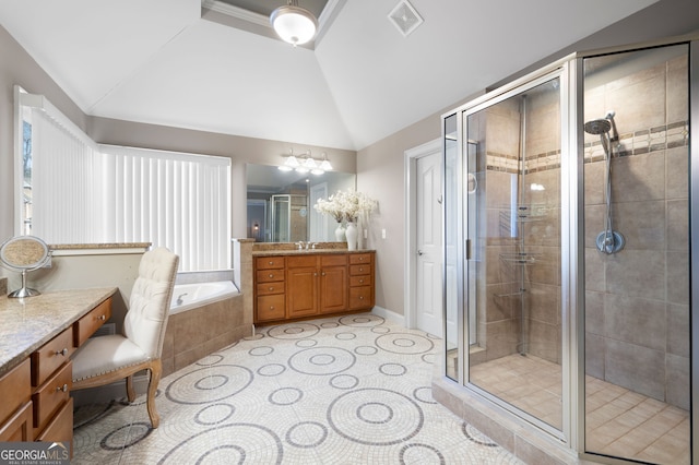 bathroom featuring tile patterned flooring, vanity, separate shower and tub, and lofted ceiling