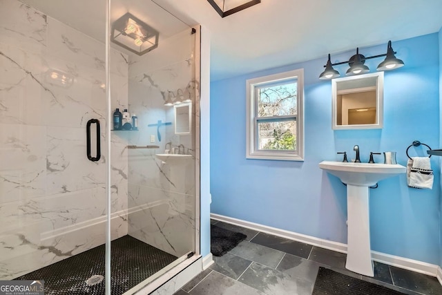 bathroom with a shower with shower door