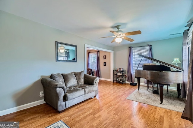 interior space with light hardwood / wood-style floors and ceiling fan