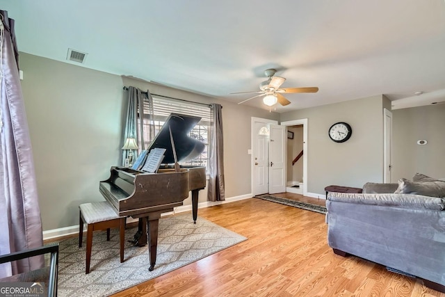 interior space featuring light hardwood / wood-style floors and ceiling fan