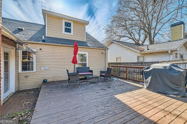 wooden terrace featuring grilling area