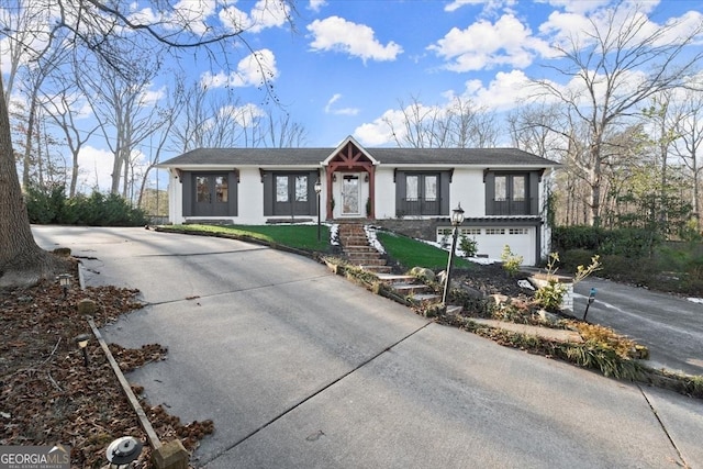 view of front of property featuring a garage