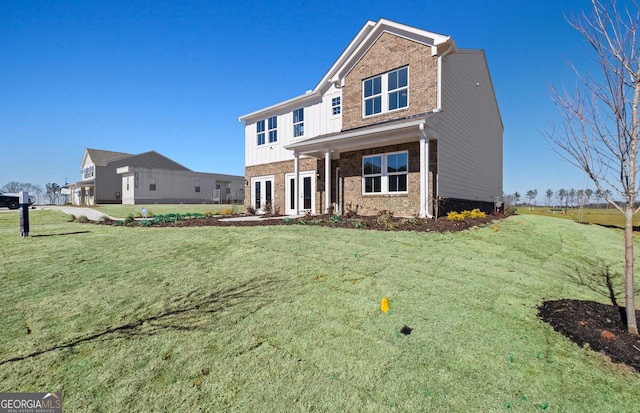 view of front facade with a front lawn