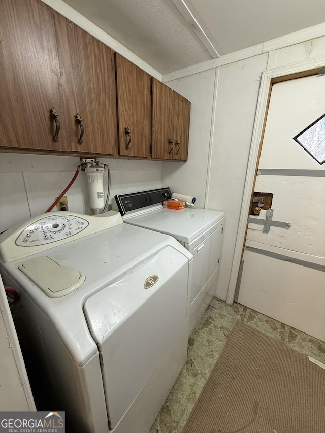 laundry area featuring cabinet space and washer and dryer