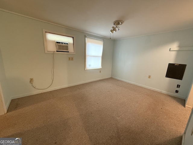 unfurnished room with light carpet, crown molding, and baseboards