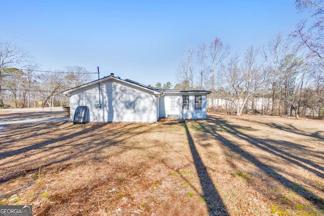 exterior space with a front yard