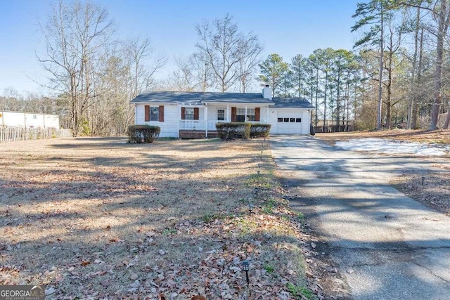 ranch-style home with a garage