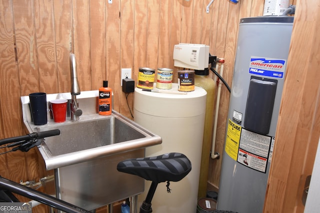 utilities with electric water heater and sink