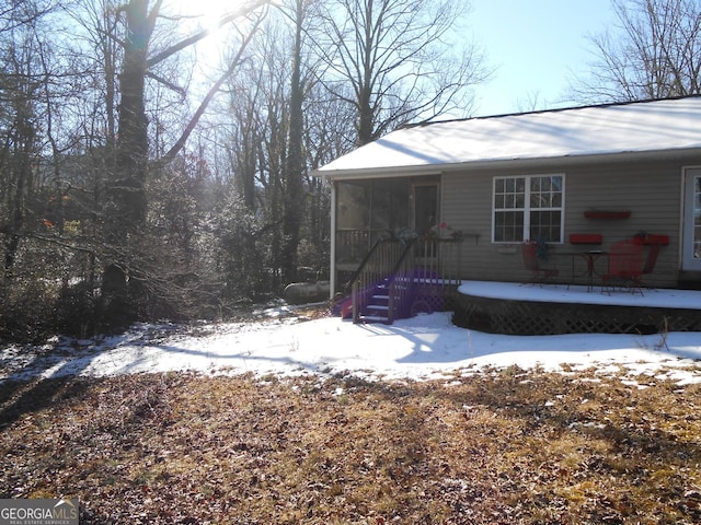 exterior space with a sunroom