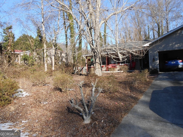 view of yard with a garage