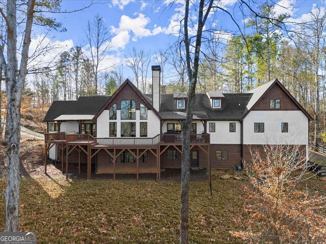 rear view of house with a deck