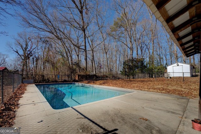 view of pool featuring a patio