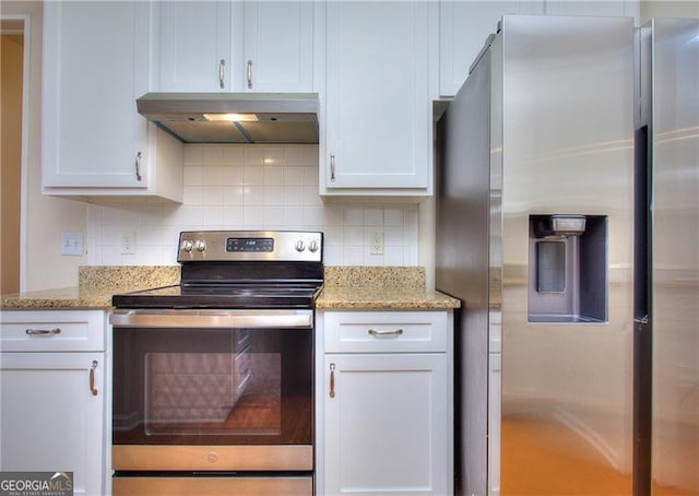 kitchen featuring white cabinetry, appliances with stainless steel finishes, decorative backsplash, and range hood