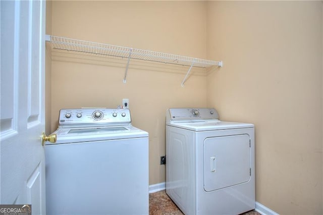 washroom with washer and clothes dryer