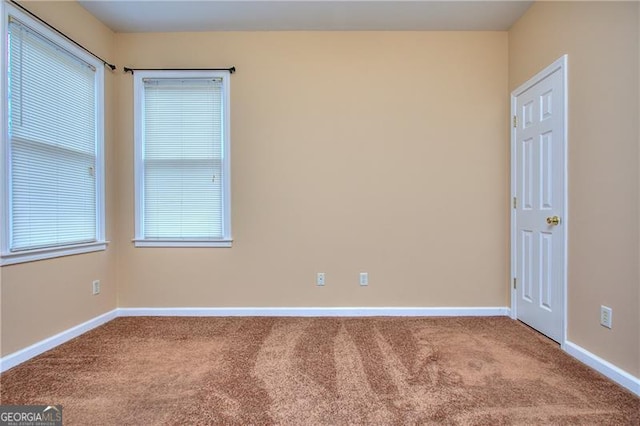 view of carpeted spare room