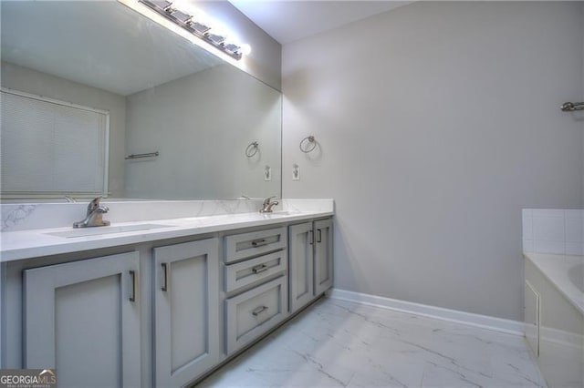 bathroom featuring vanity and a bathing tub