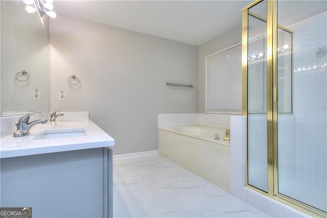 bathroom featuring vanity and separate shower and tub