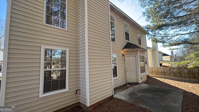 view of property exterior featuring a patio