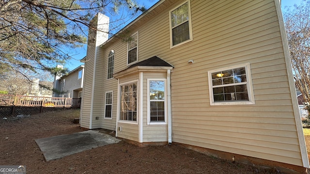 rear view of property with a patio area