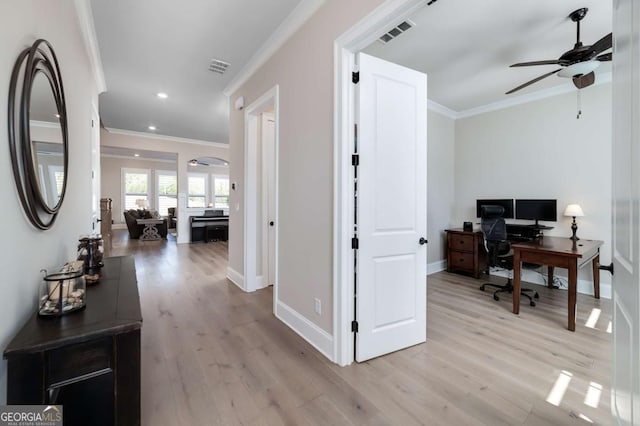 office with ceiling fan, ornamental molding, and light hardwood / wood-style floors