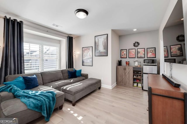 living room featuring light hardwood / wood-style flooring